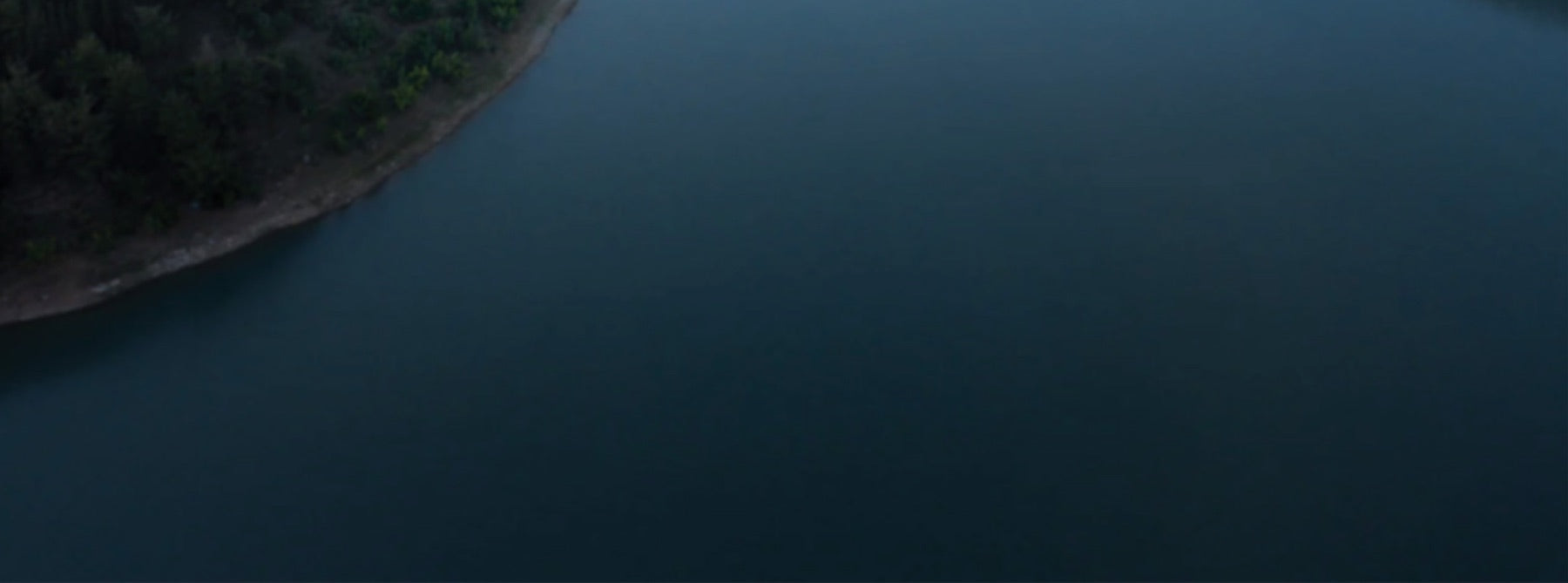 Serene reservoir at dawn